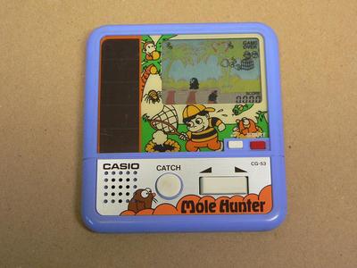 ahandheldempire.com_game_images_tn_400x300_477_3557_1339849527985_Casio_Mole_Hunter.jpg